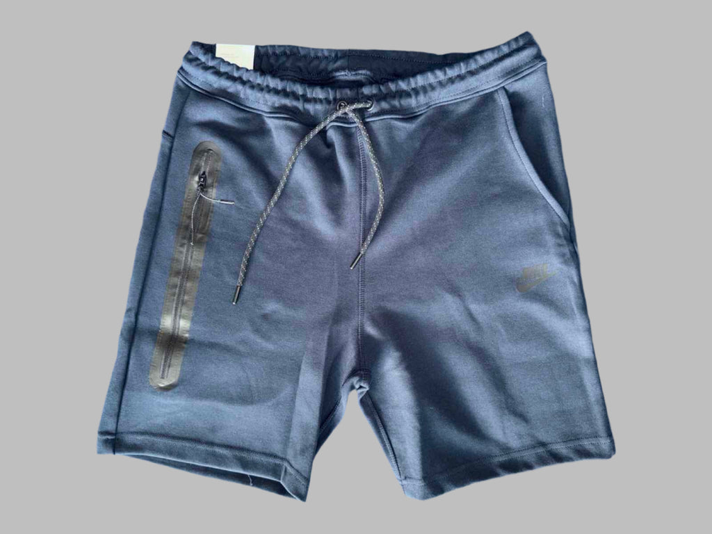 Nike Tech Fleece férfi sportnadrág, sötétkék színben.